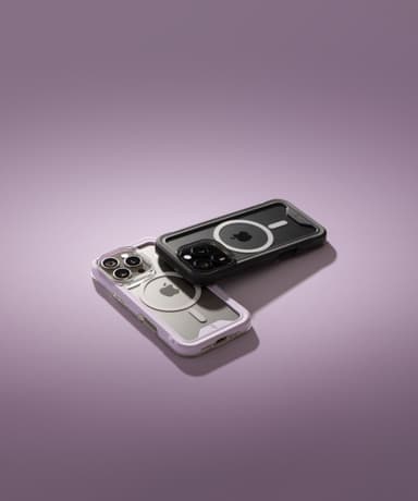 A purple-bumper ZIZO ION MagSafe case overlapping a black-bumper one on a soft purple gradient background
