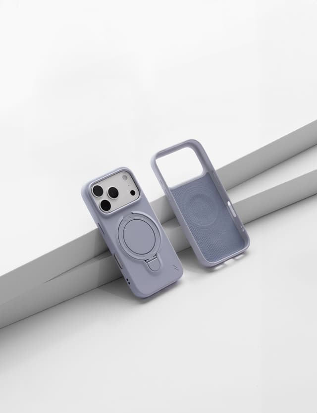 A pale lavender ZIZO Revolve case shown front and back, propped against a gray riser on a white studio floor