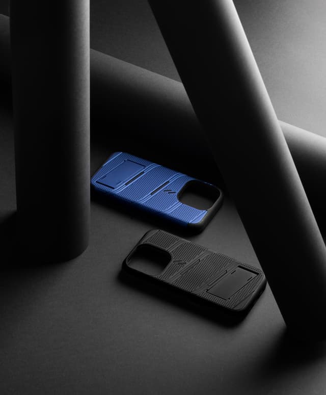 Two ZIZO Bolt cases, blue and black, showing the textured dot-grip shell and raised ridge lines