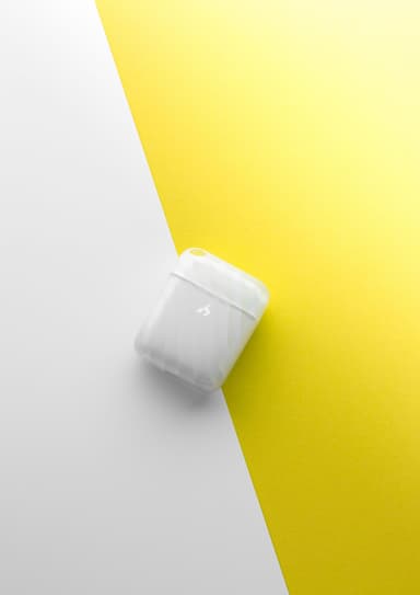 A closed frosted ZIZO Halos case on a split white and yellow background