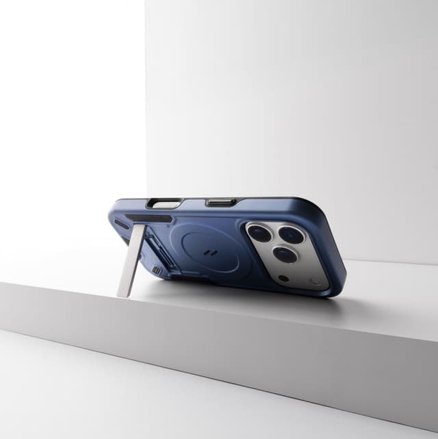 ZIZO Transform MagSafe case in blue from a low three-quarter view, kickstand deployed and holding the phone upright
