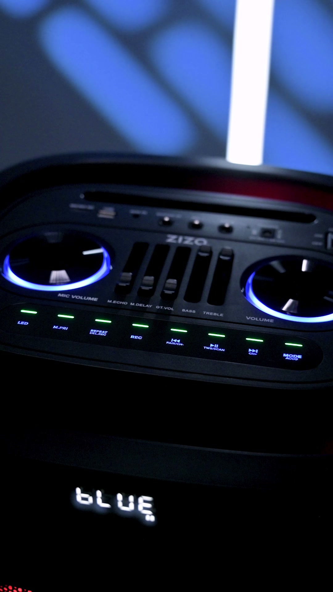 Wide view of the ZIZO Boom speaker's top control panel with twin jog wheels, EQ sliders and lit buttons